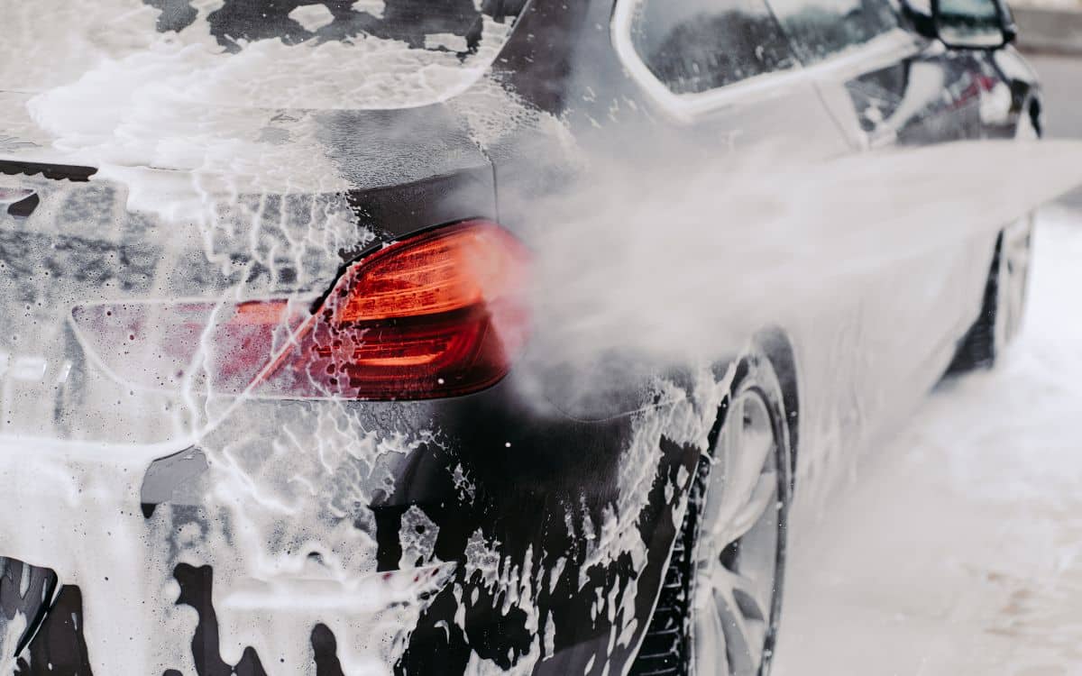 West Delray Collision Center auto detailing photo of exterior car washing on a black BMW West Delray Collision Center auto detailing photo of exterior car washing on a black BMW