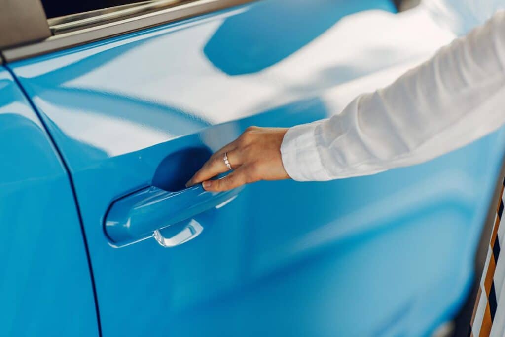 A blue automobile after scratch and dent repair in Delray Beach, Florida