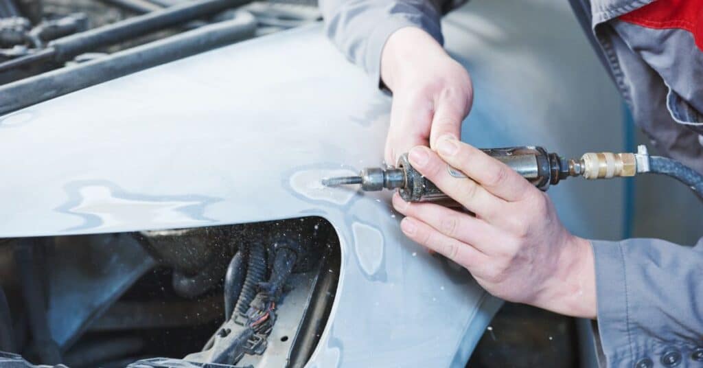 Vehicle panel repair performed by certified collision repair technician