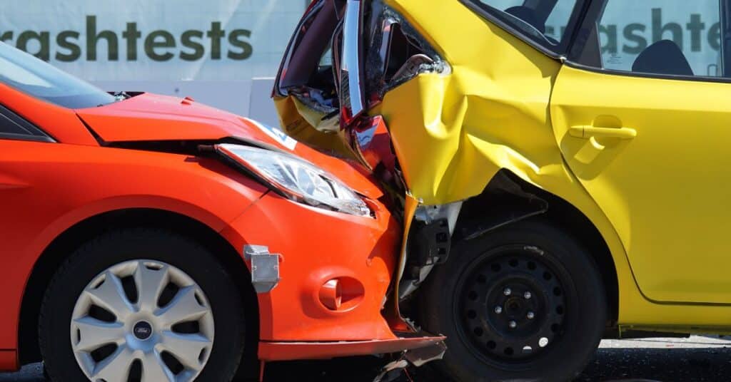 Front-end vehicle collision damage requiring auto body repair